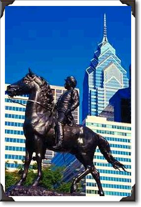 Cavalry soldier surveys urban setting, Philadelphia