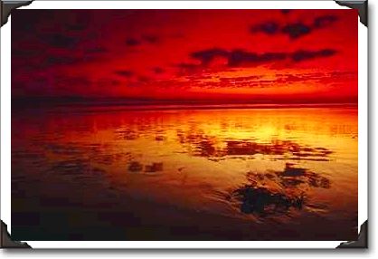 Summer sky reflections, low tide, Huntington Beach, California
