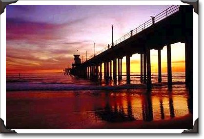 Low tide reflections at sundown, Huntington Beach pier, California