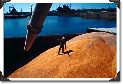 Barge being loaded with grain on Mississippi River in Dubuque, Iowa