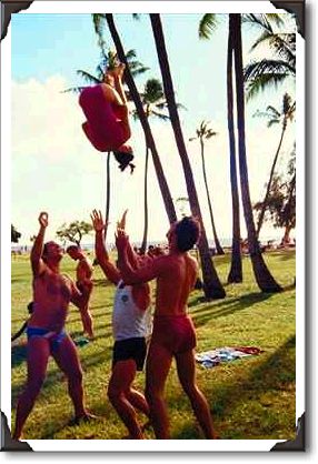 Young gymnasts practice routines, Waikiki Beach
