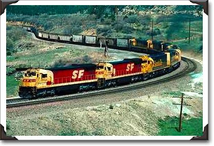 AT&SF GE #9552 leads coal unit train over Raton Pass, CO