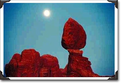 Moon over rock formations, Arches National Park, Utah