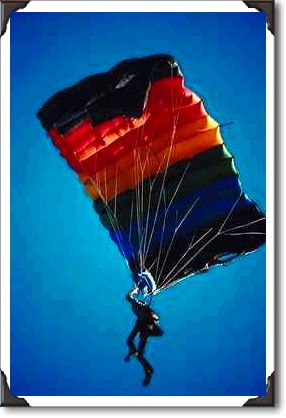Sky diver, parachute opens near ground, Arizona