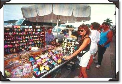 Sidewalk vendor and shoppers, Charlotte Amalie, St. Thomas