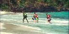 Divers emerge from the water, Coki Beach, St. Thomas
